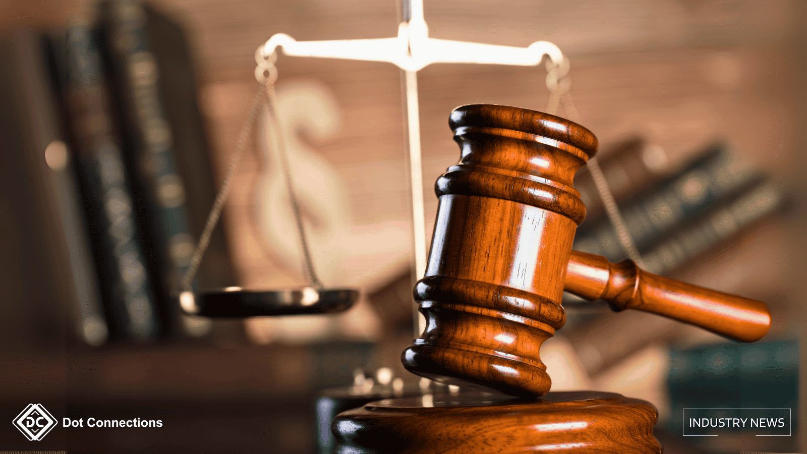 A wooden judge’s gavel and a legal balance scale in front of law books, symbolizing legal decisions and justice.