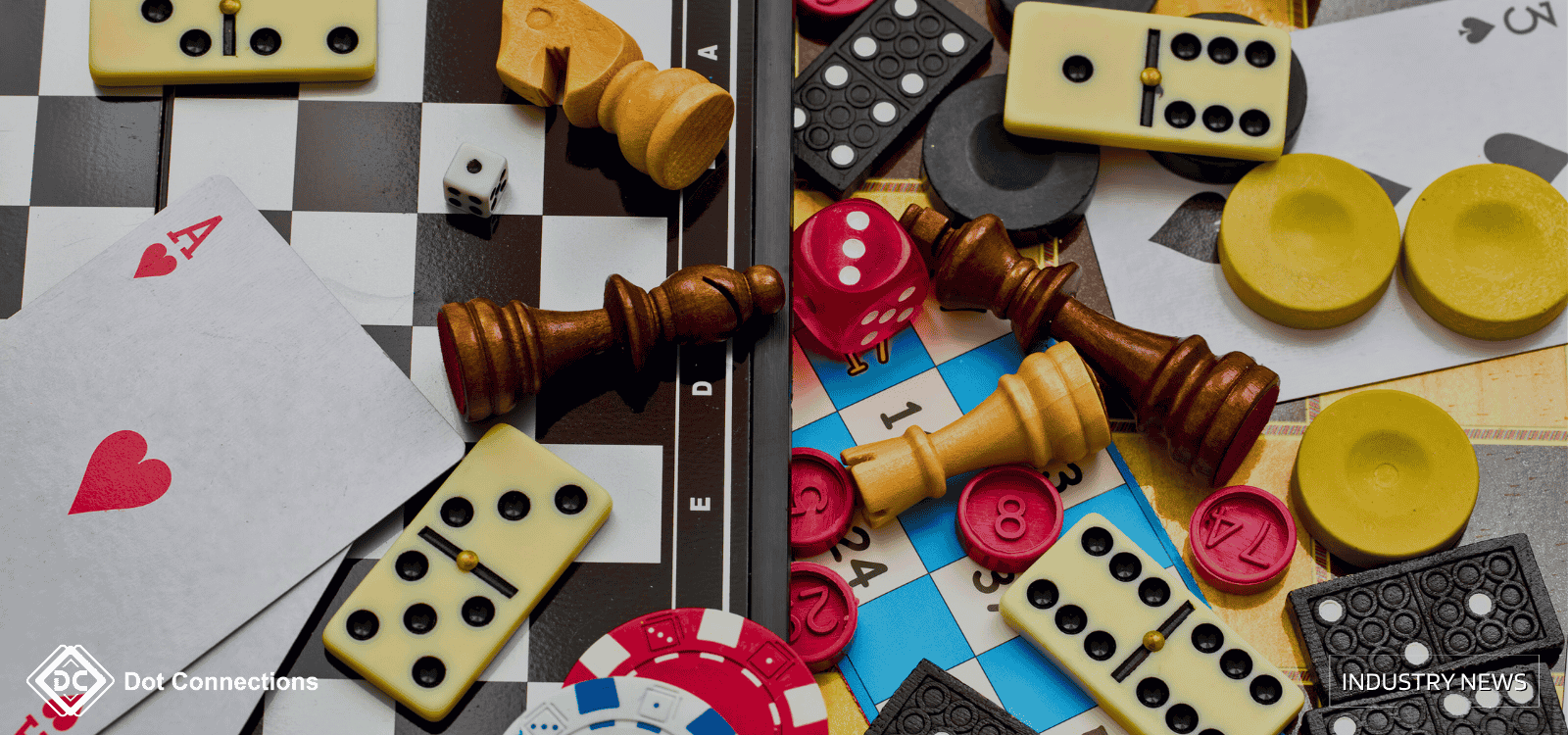 Assorted gaming pieces, cards, dice, chips, and dominoes on a board