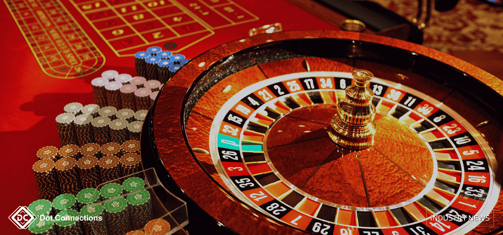 Roulette wheel and casino chips on a red table, Thailand iGaming context