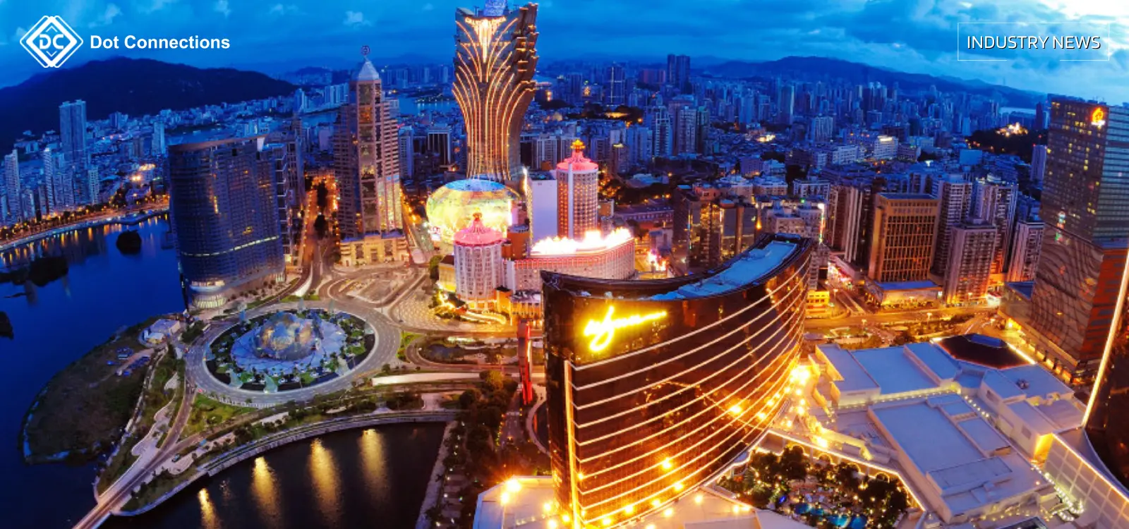 Night skyline of Macau integrated resorts and casinos, aerial view.