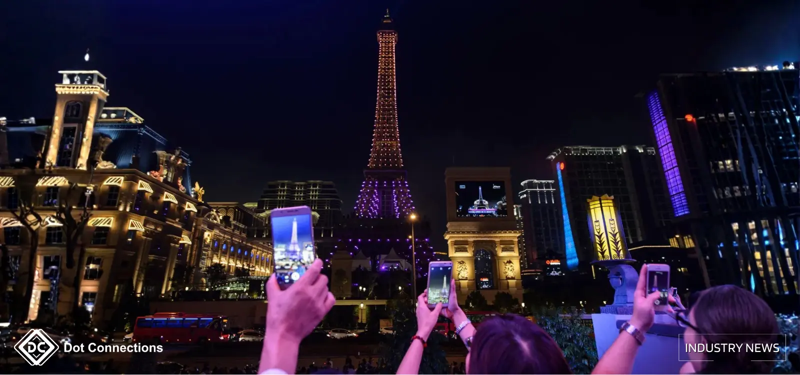 Crowd photographing the Parisian Macao Eiffel Tower at night — Macau 2025 GGR